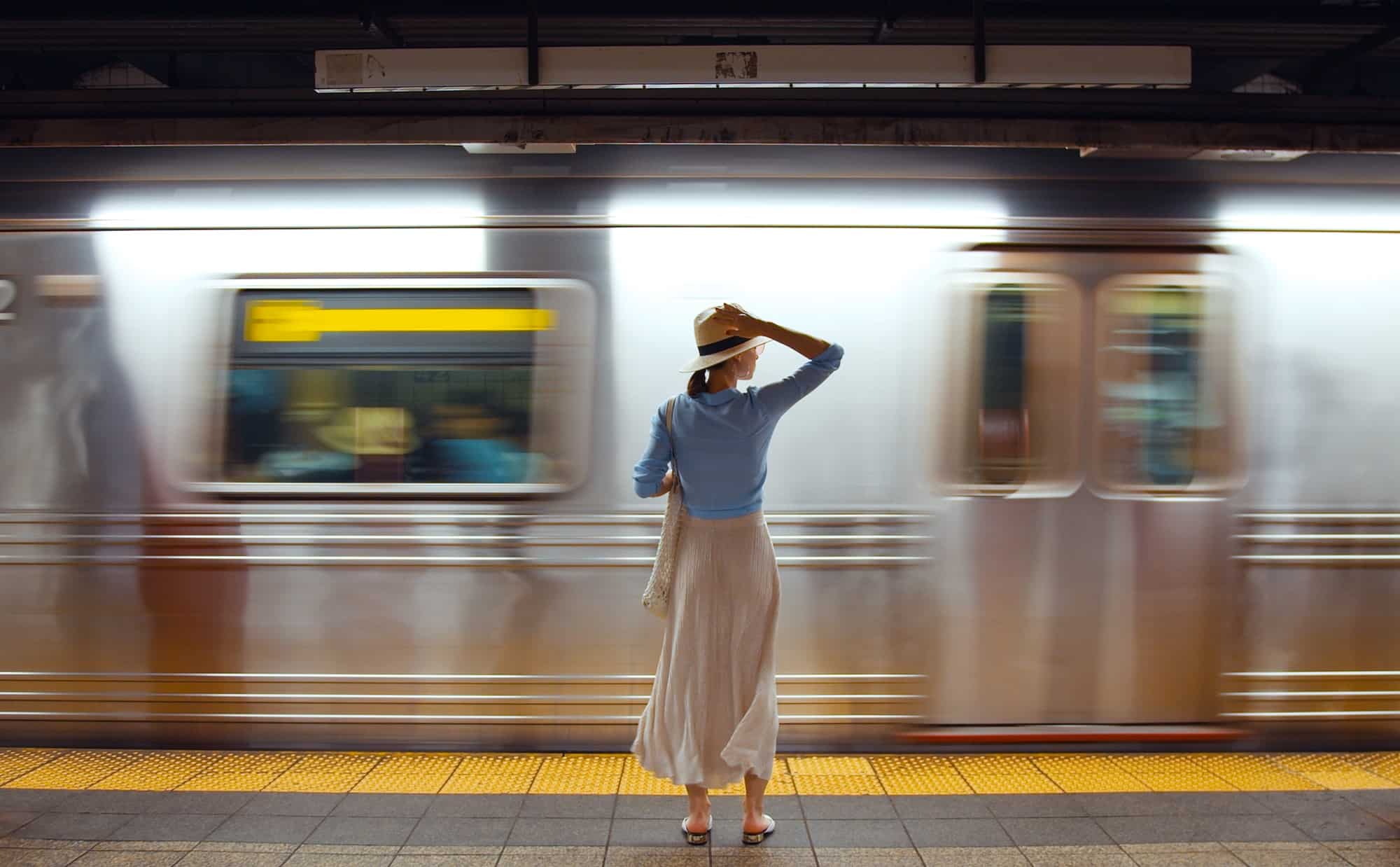 Attractive girl waiting for a train