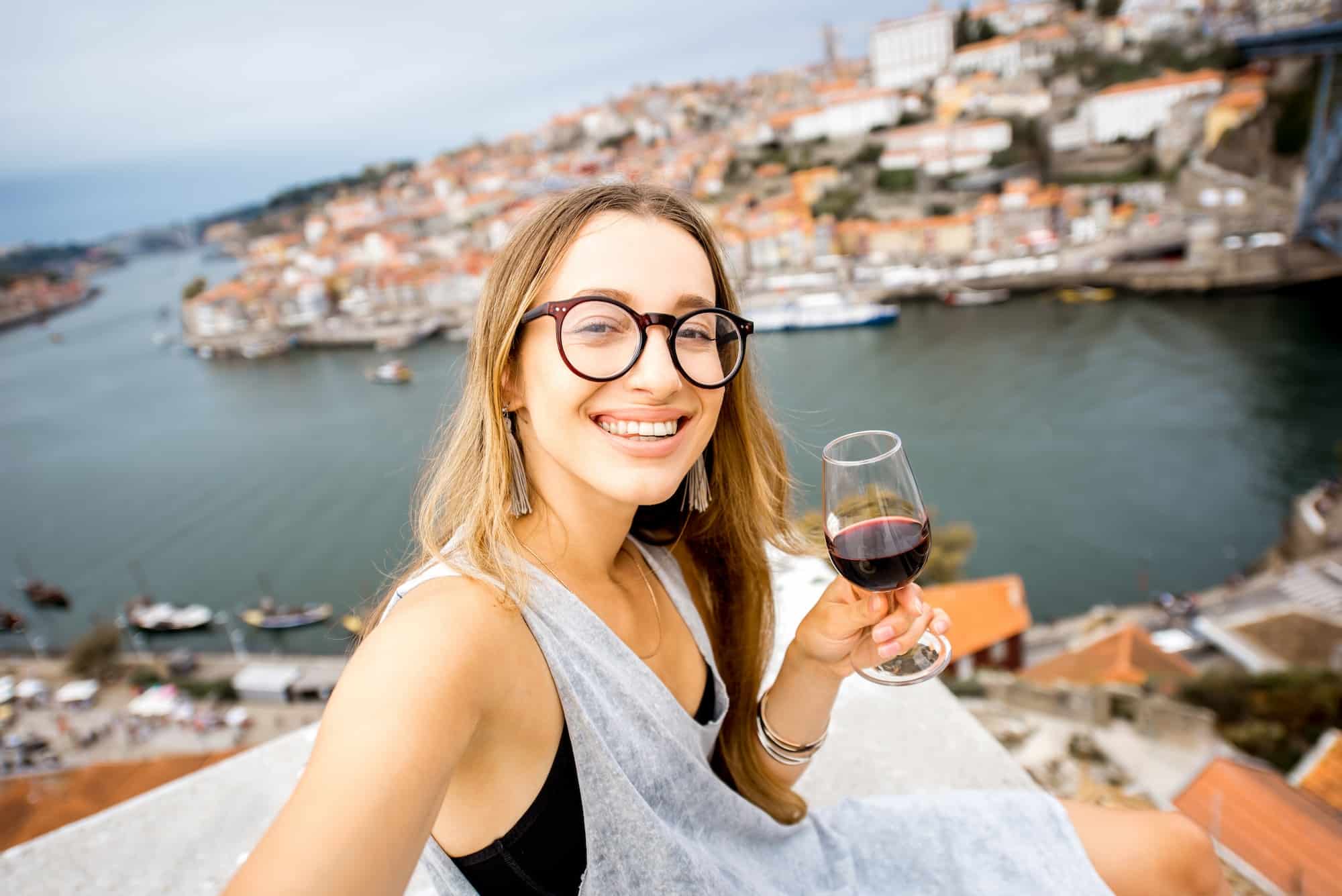 Woman with Porto wine in Portuguese