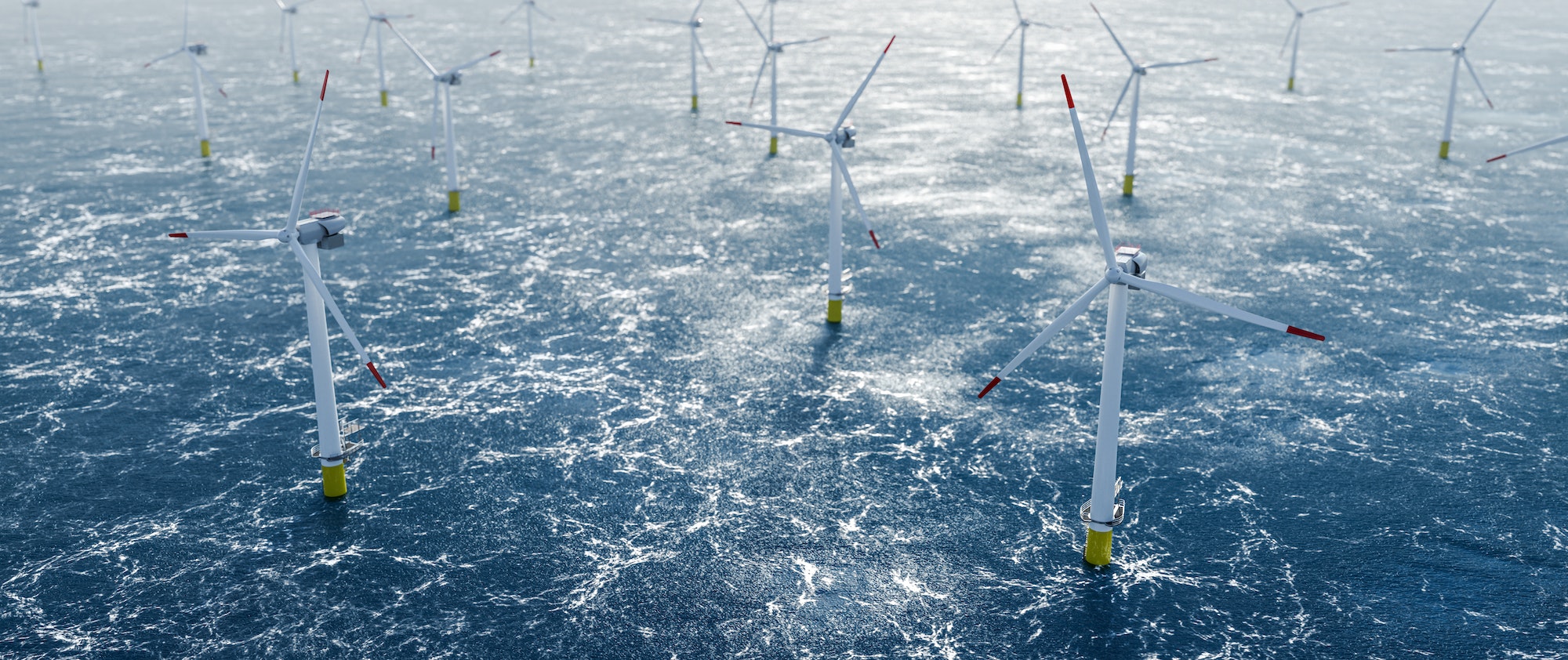 Offshore wind power and energy farm with many wind turbines on the ocean