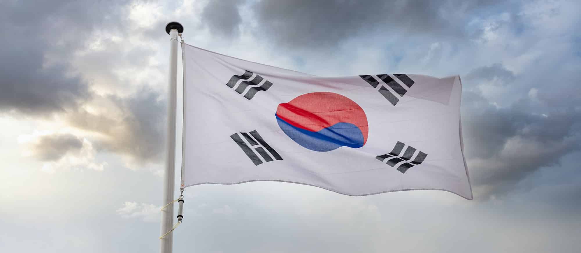 South Korea flag waving against cloudy sky