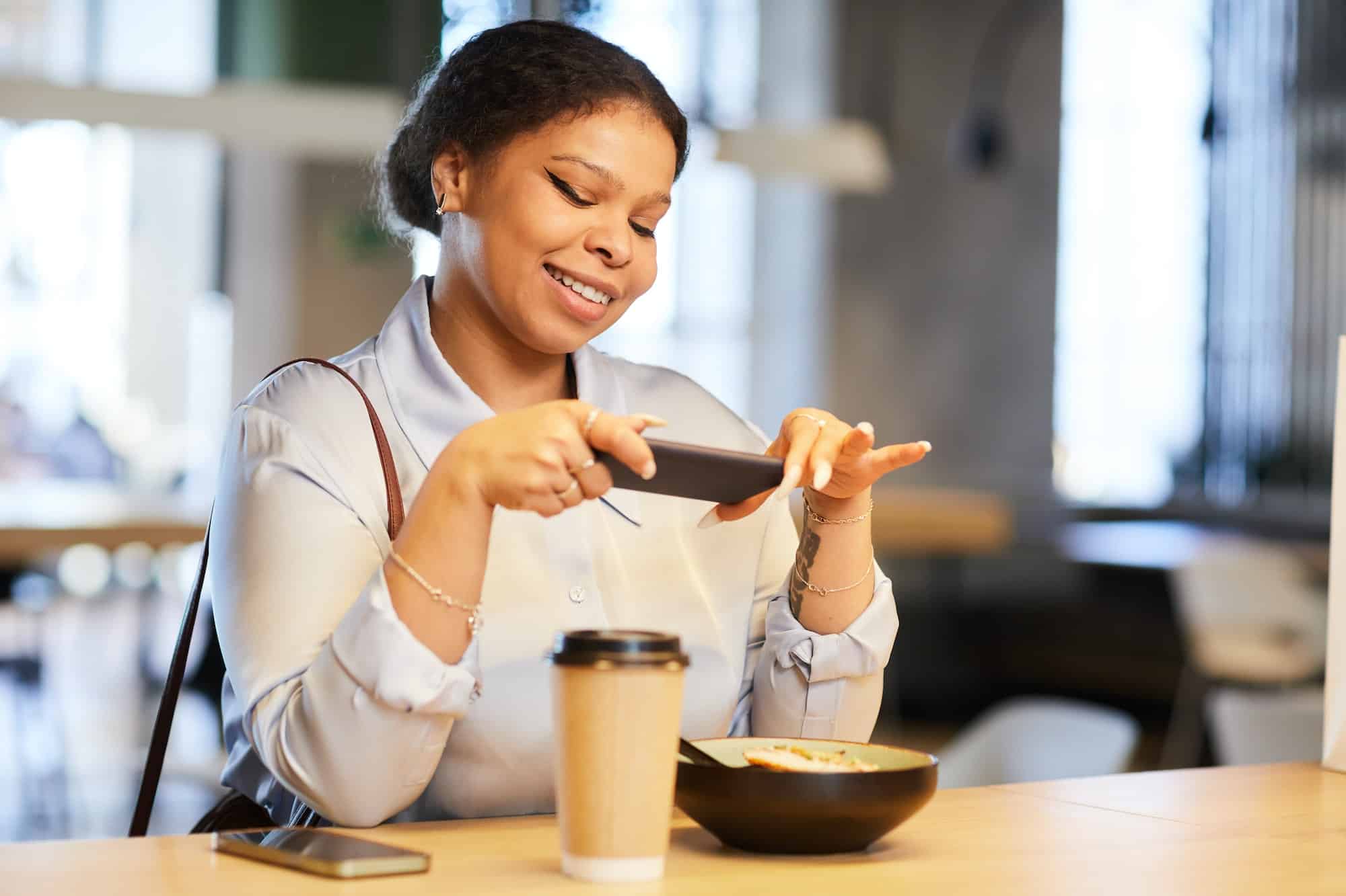 Woman Taking Photo of Food for Social Media