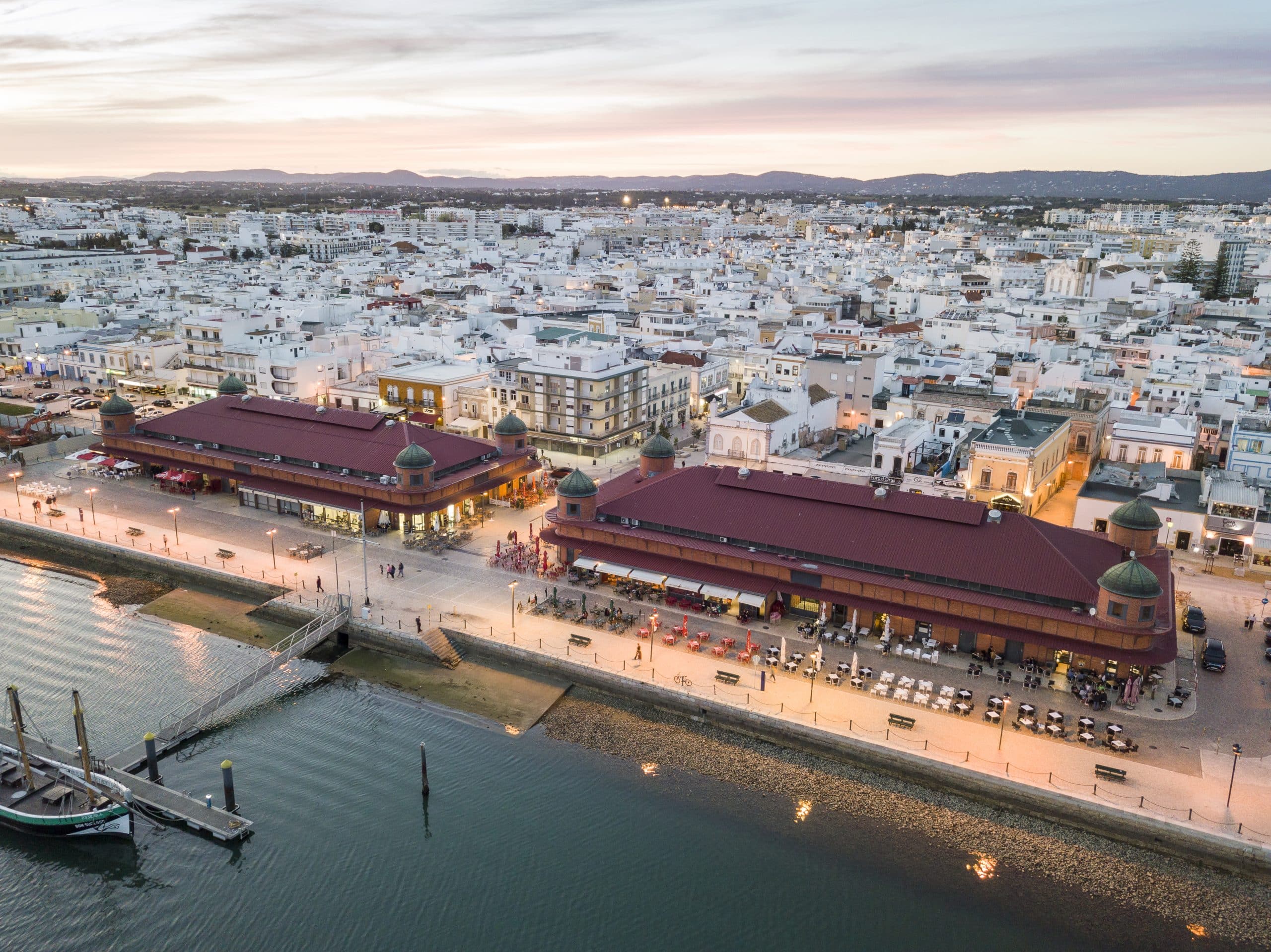 Olhao with two market buildings by Ria Formosa in the evening, Algarve, Portugal