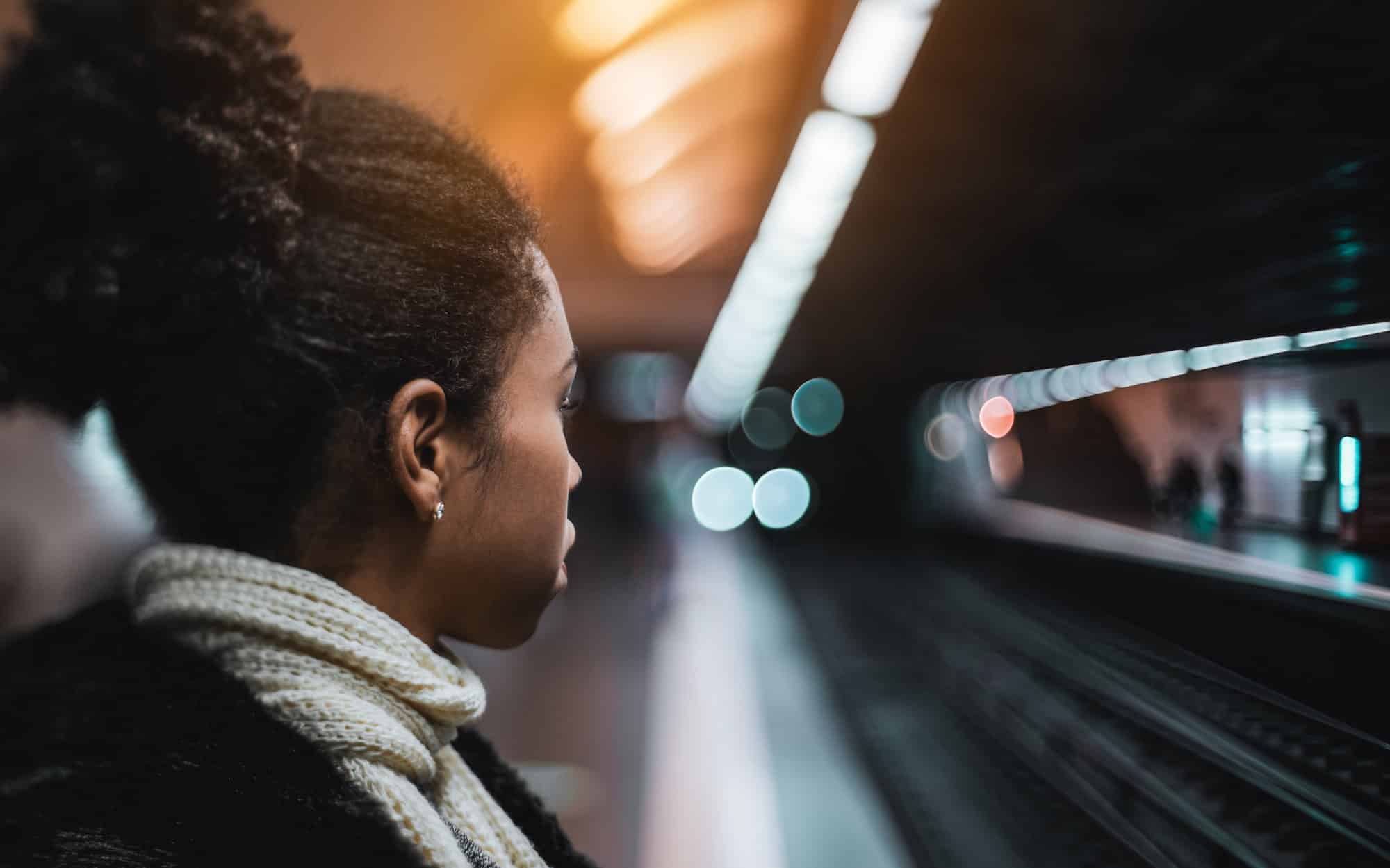 Biracial girl on the metro platform