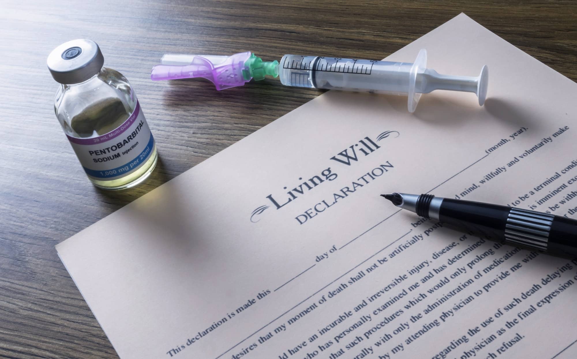 Living will declaration form Next to a vial of pentobarbital sodium