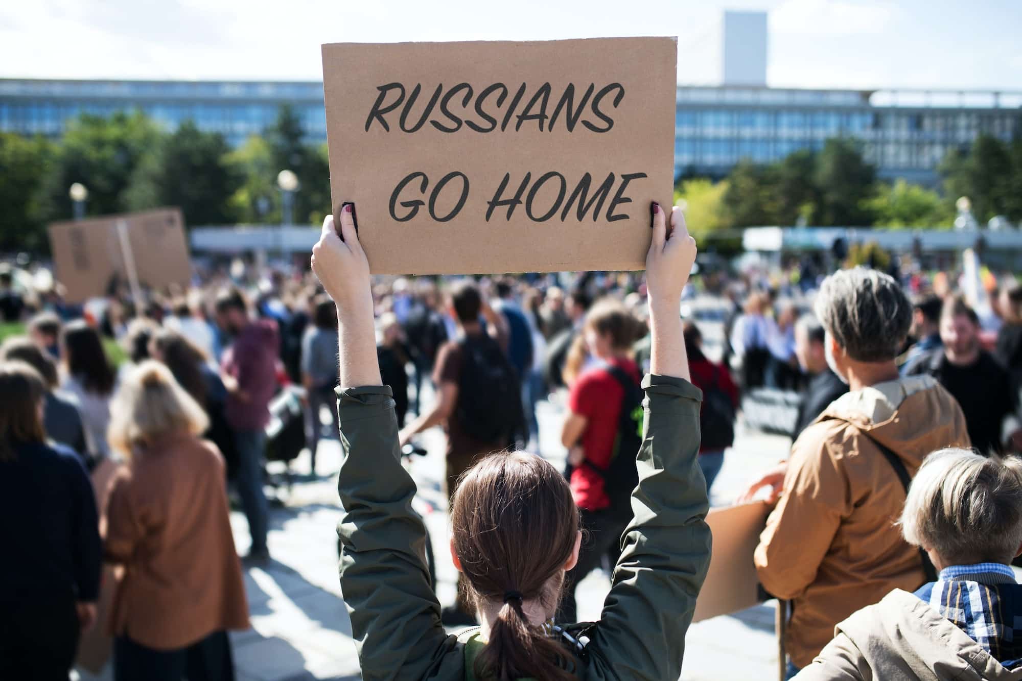 Protest against Russian invasion of Ukraine. People holding anti war sings and banners in street