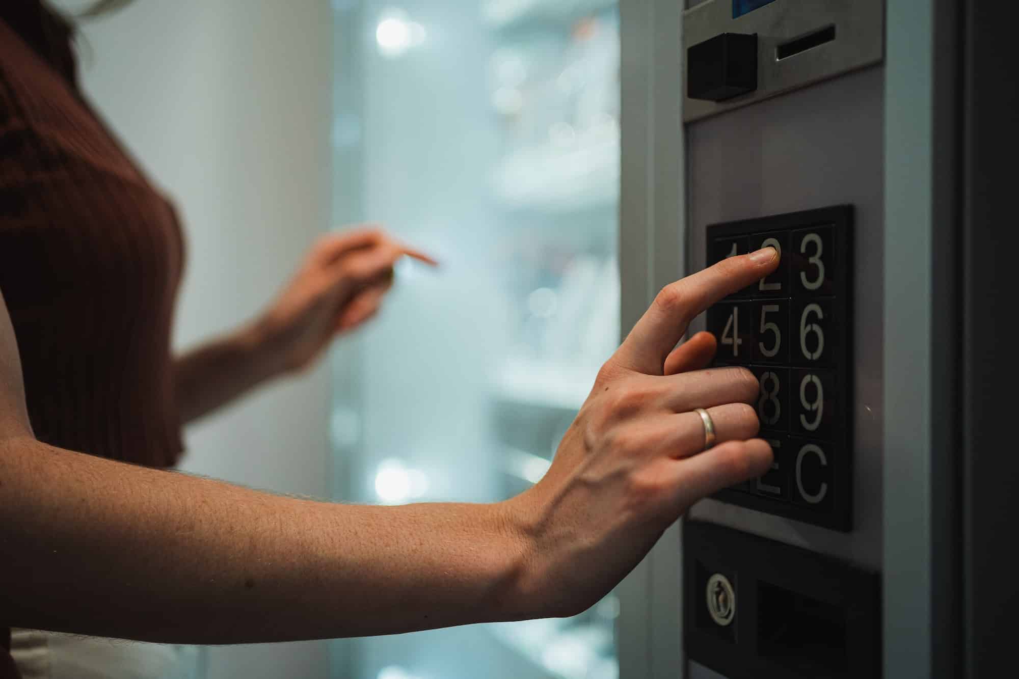 Student girl using vending machine