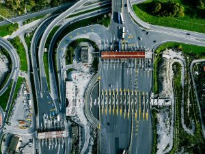 Aerial view gate for expressway fee payment in the city, toll collection point on the motorway