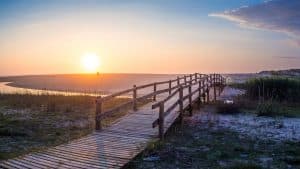 Beautiful shot of a bridge next to a beach in Praia Velha, São Pedro de Moel, Leiria, Portugal