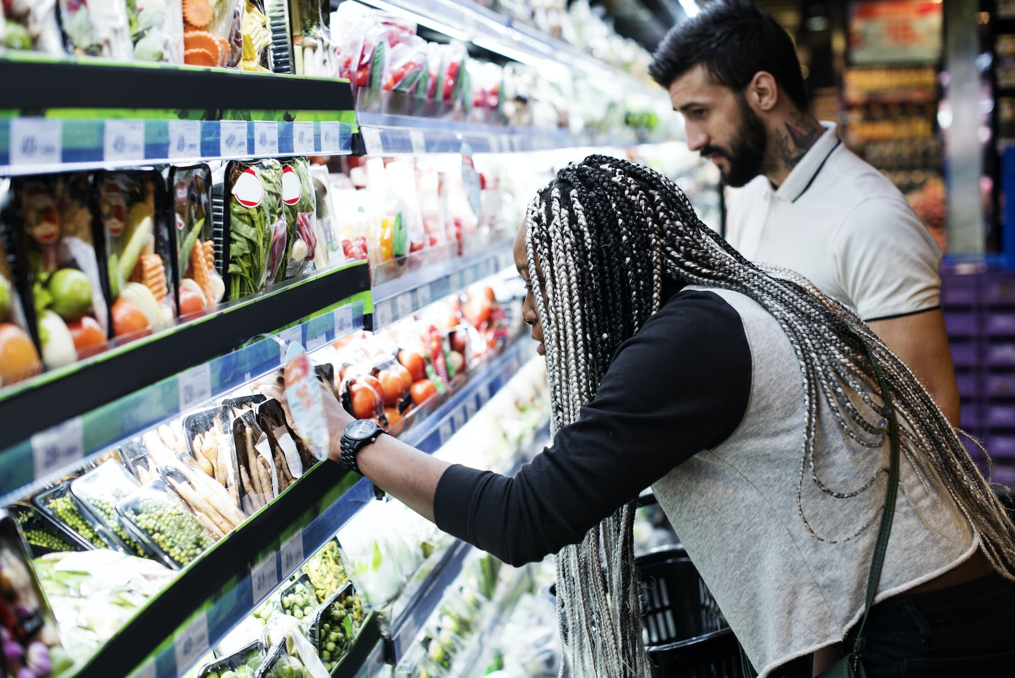 A couple shopping for food