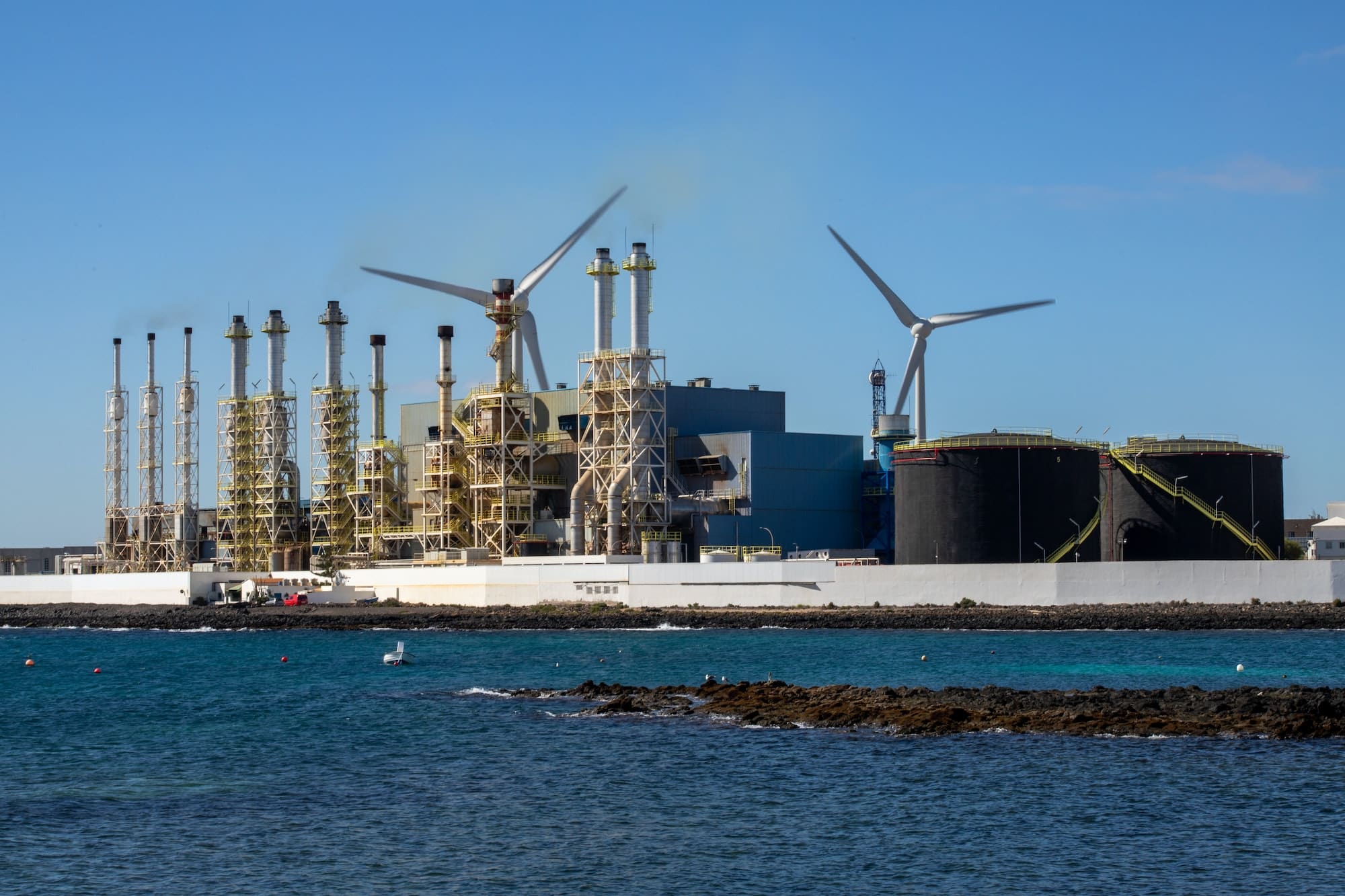 Beautiful view of seawater desalination power station under a clear blue sky