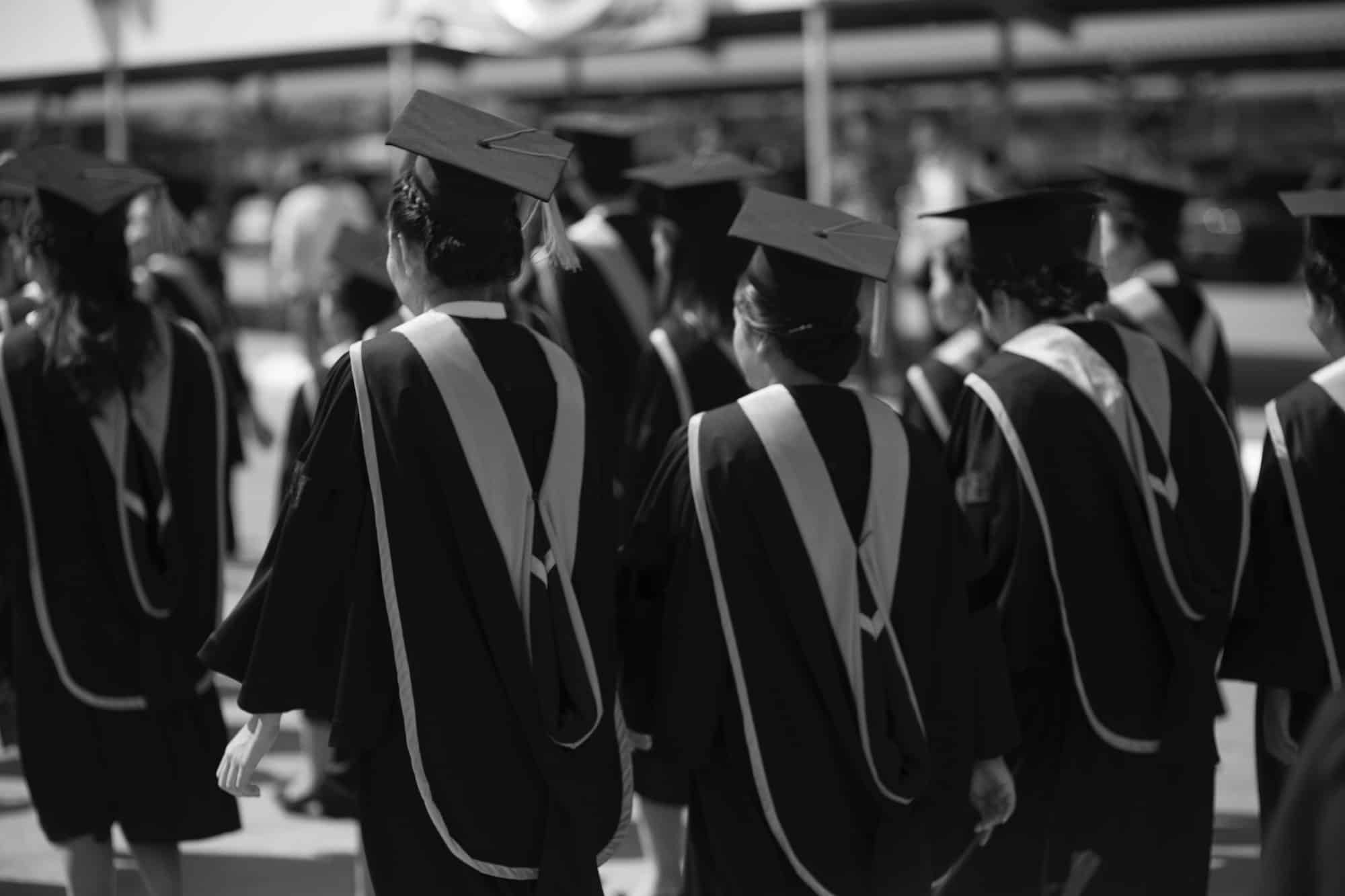 Graduates are walking in line to get your degree,monotone