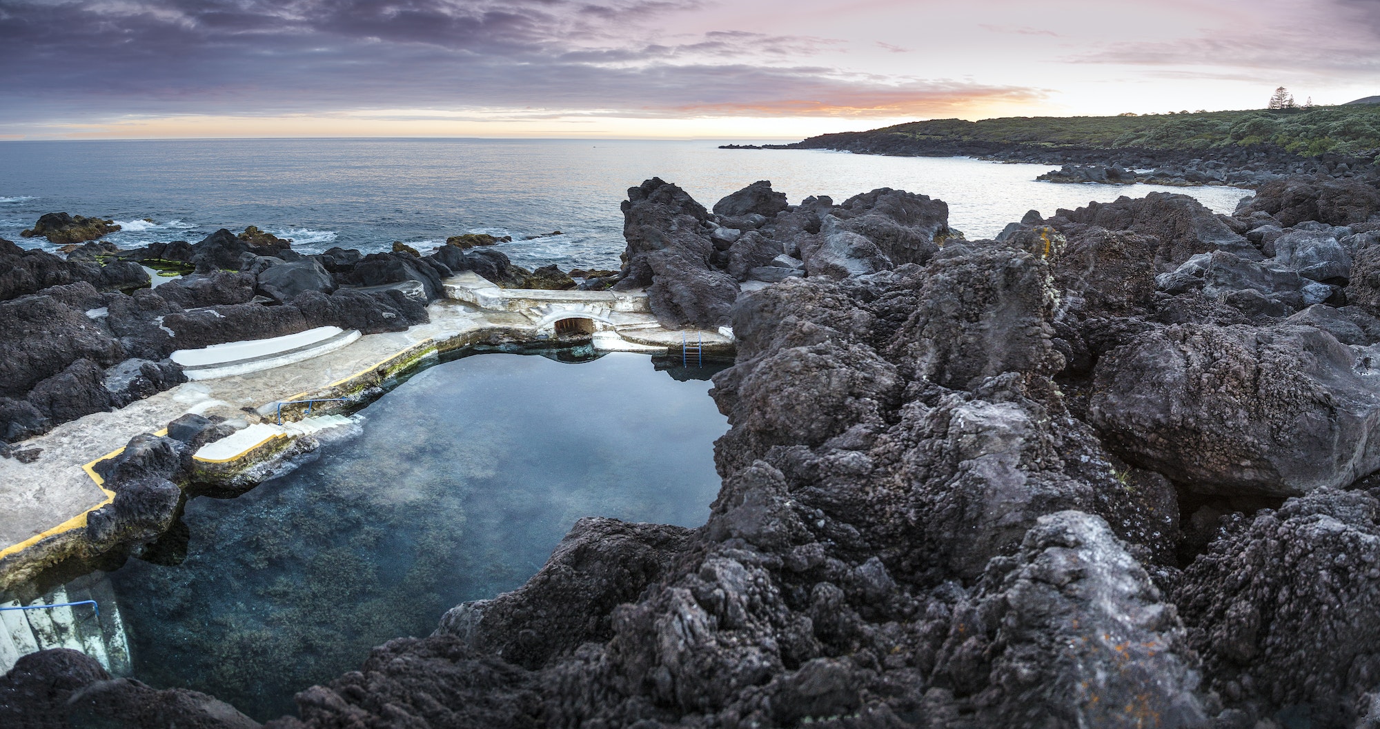 High angle view of rock formations in beach