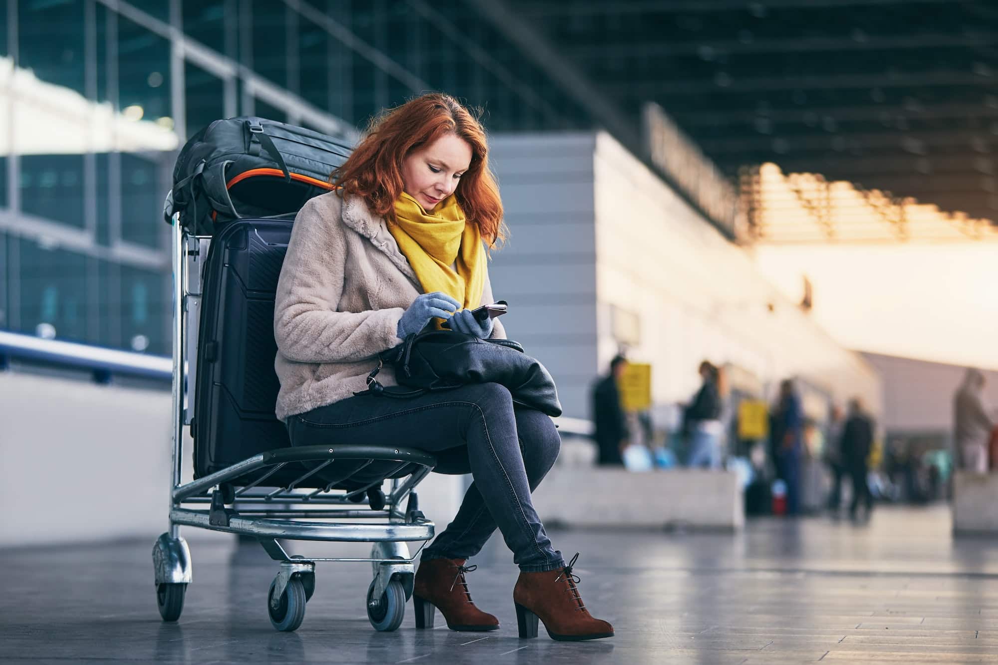 Young woman waiting at airport