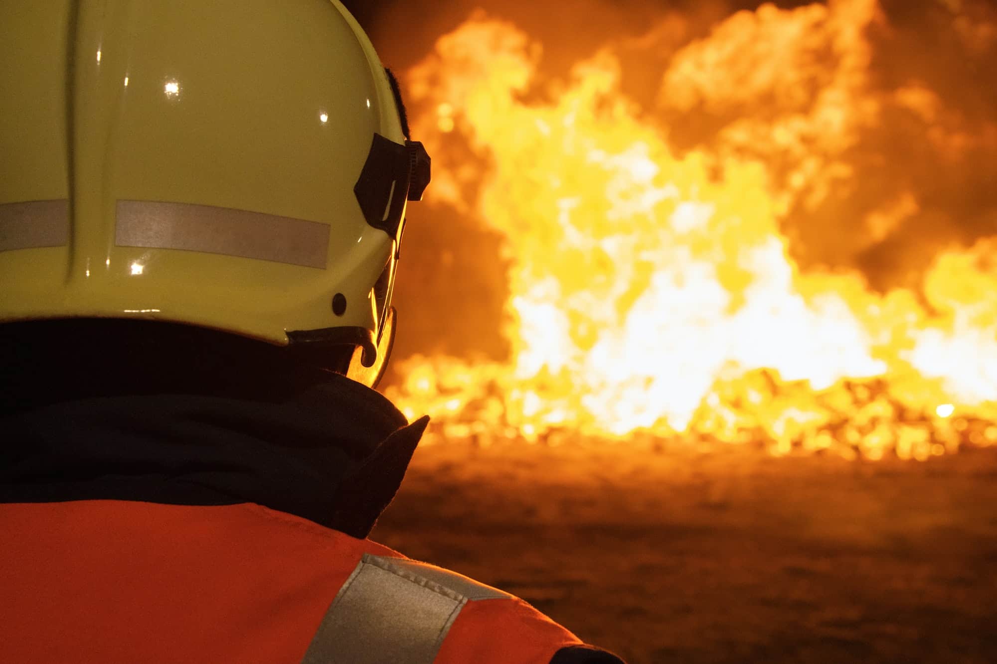 Firefighters putting out a fire. Destruction and disaster