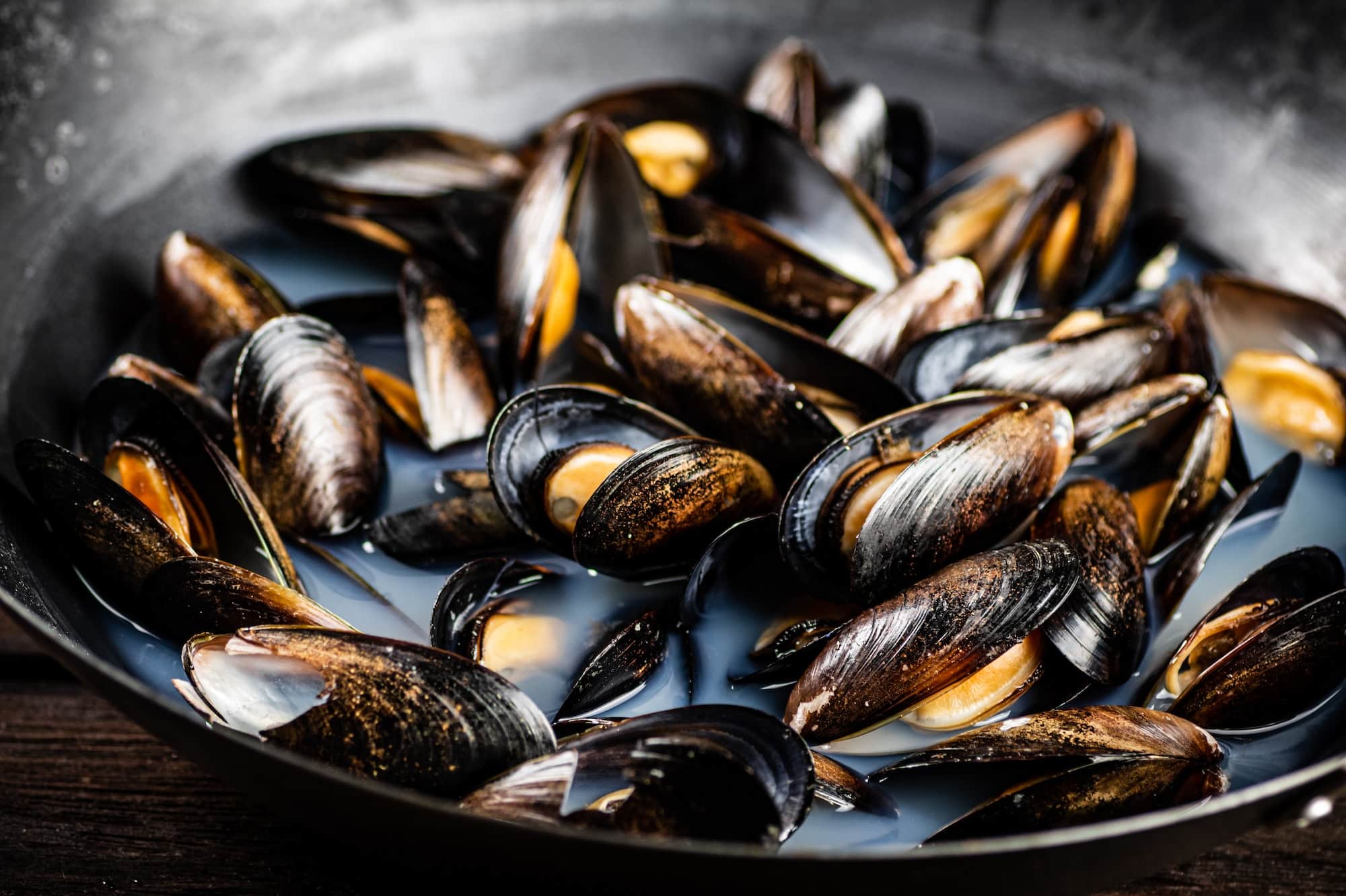 Mussels in a pot of water.