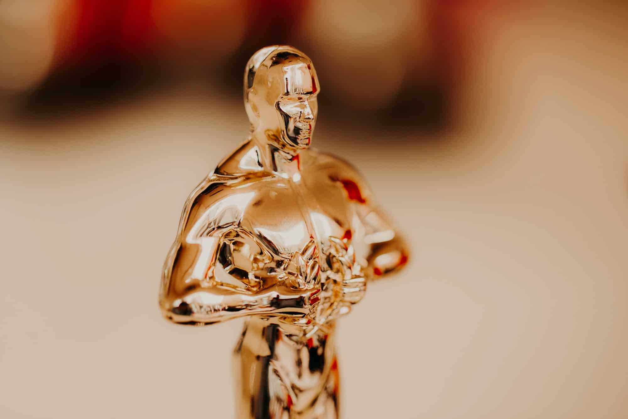 Nomination and Oscar reward concept. Golden statue for victory and success. Academy reward