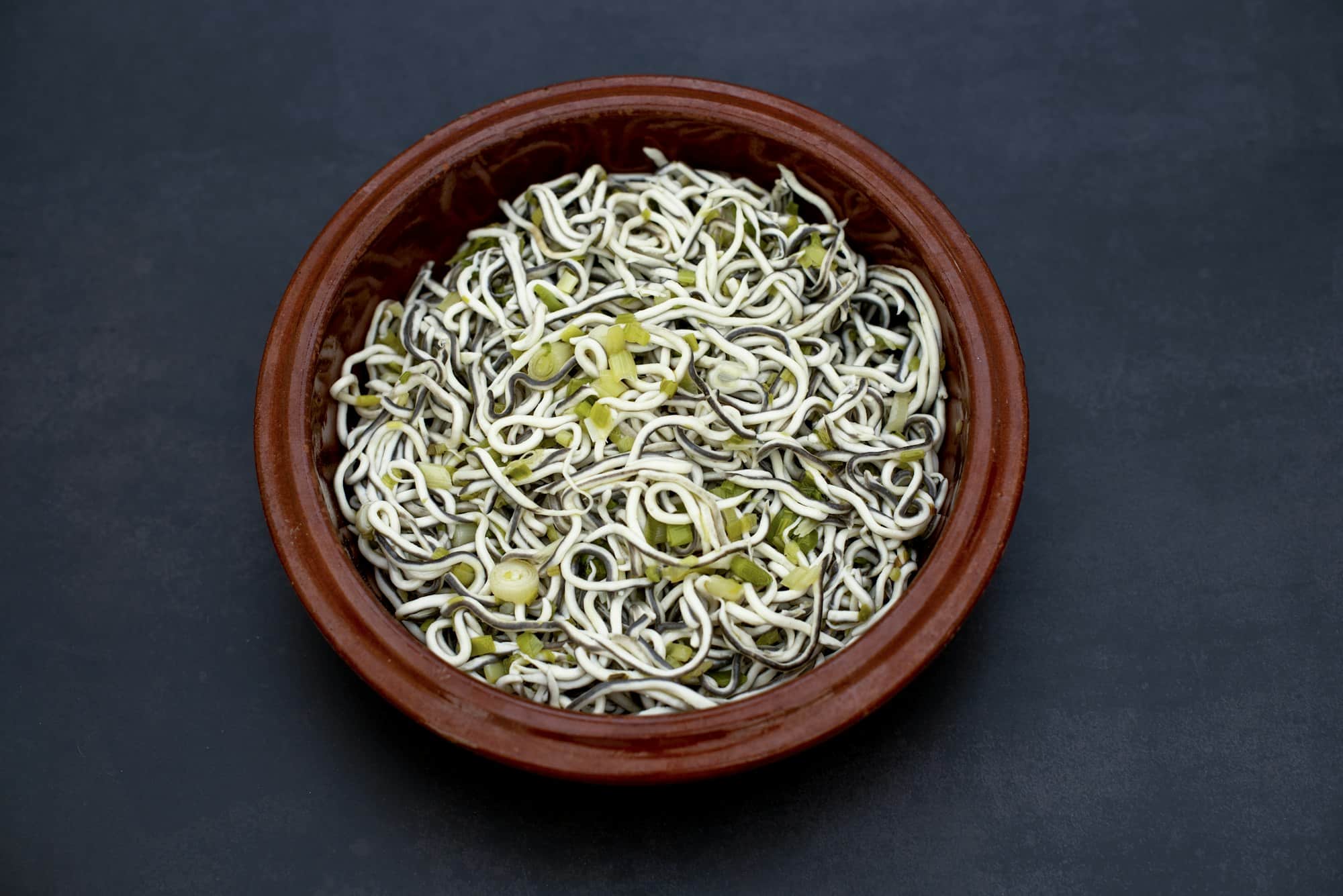 Top view of a plate of delicious elvers, traditional Spanish food