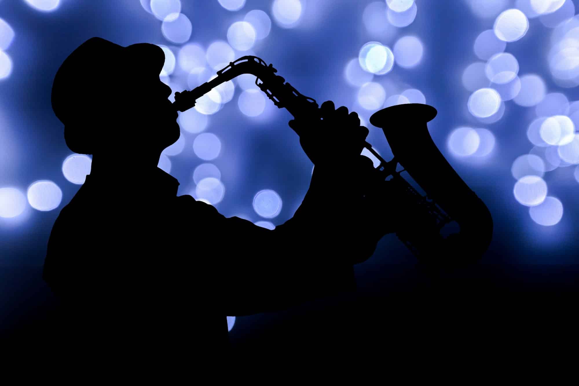 Jazz saxophone player in performance on the stage.