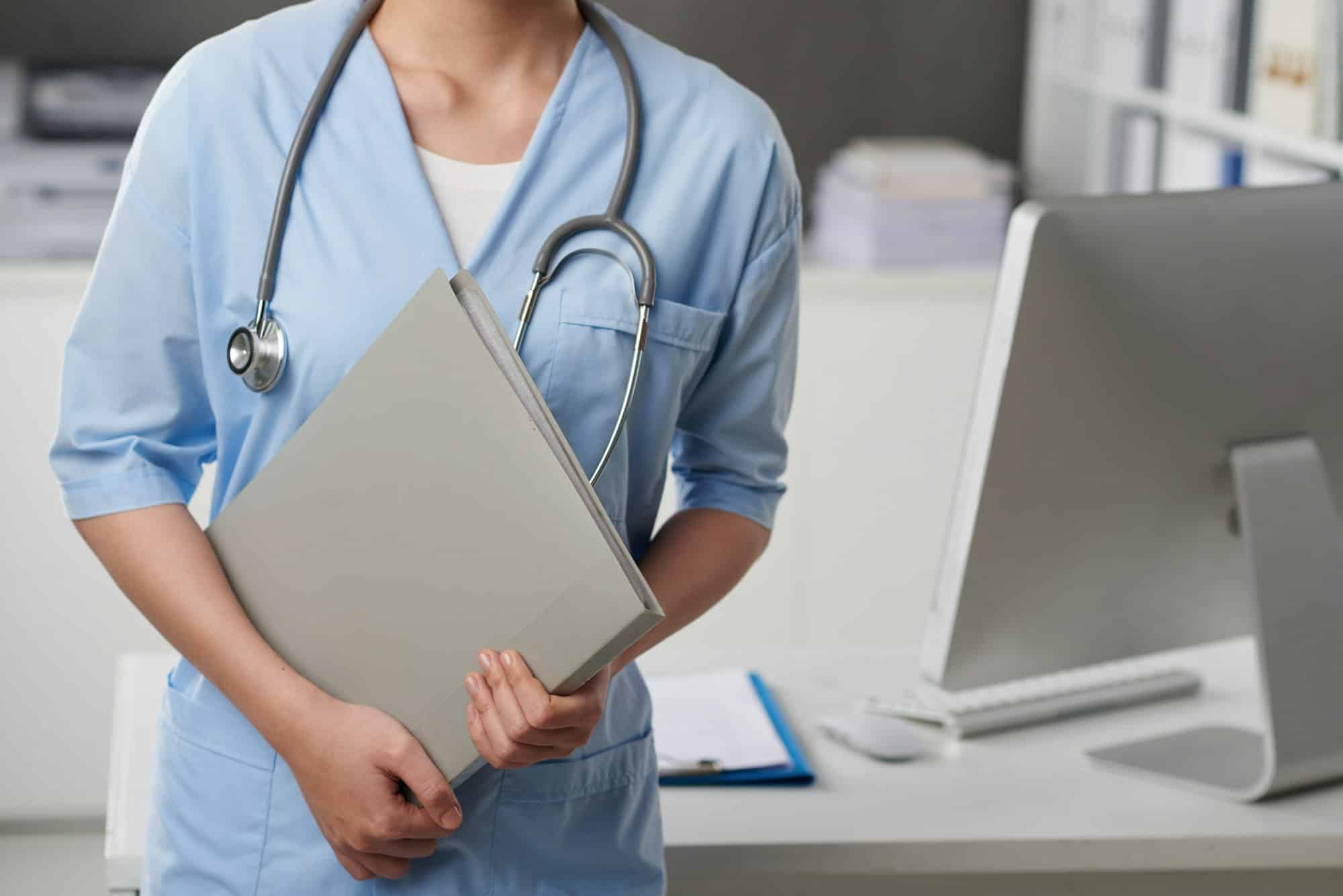 Nurse with medical documents