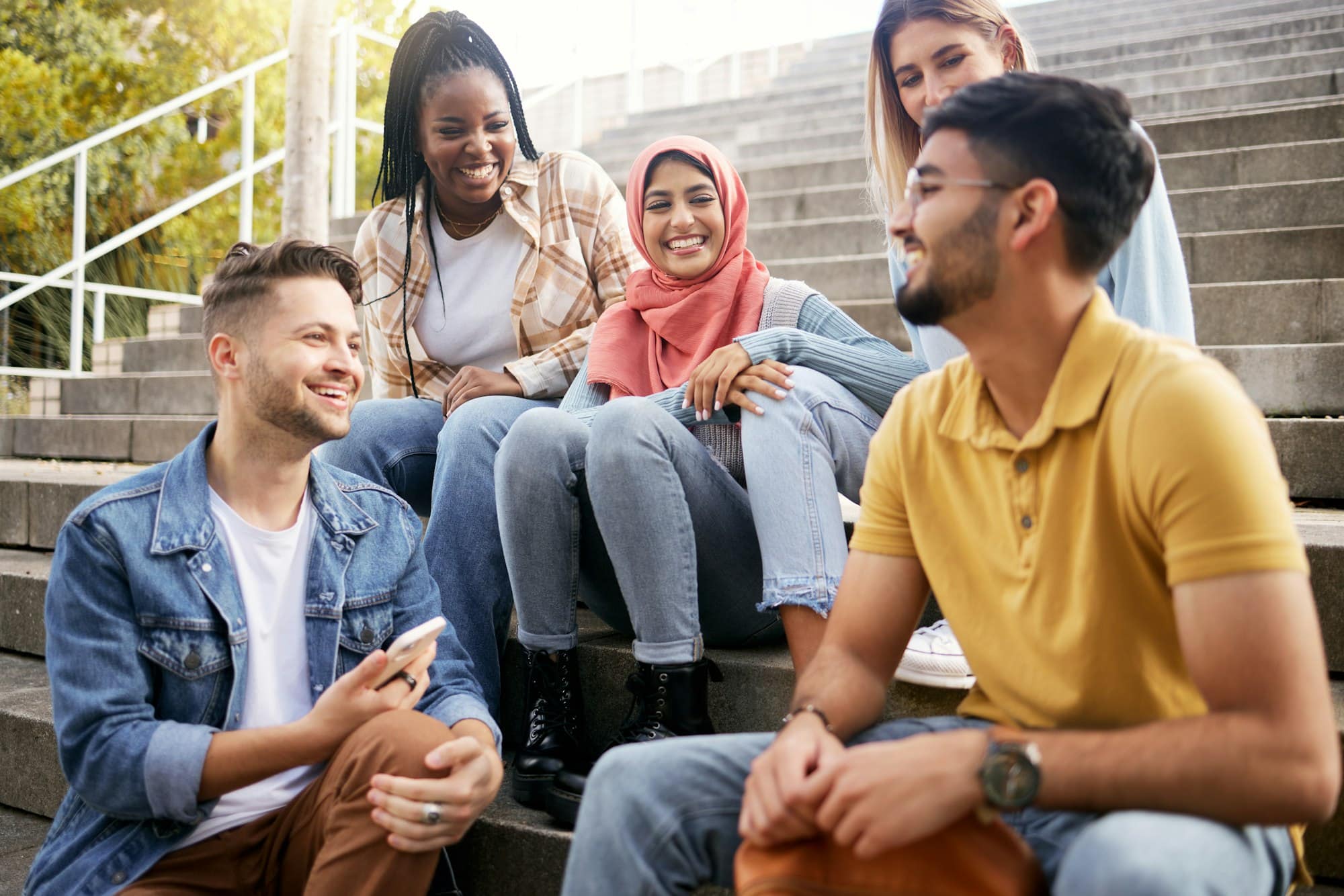 Relax, diversity or students on steps at break talking or speaking of goals, education or future pl