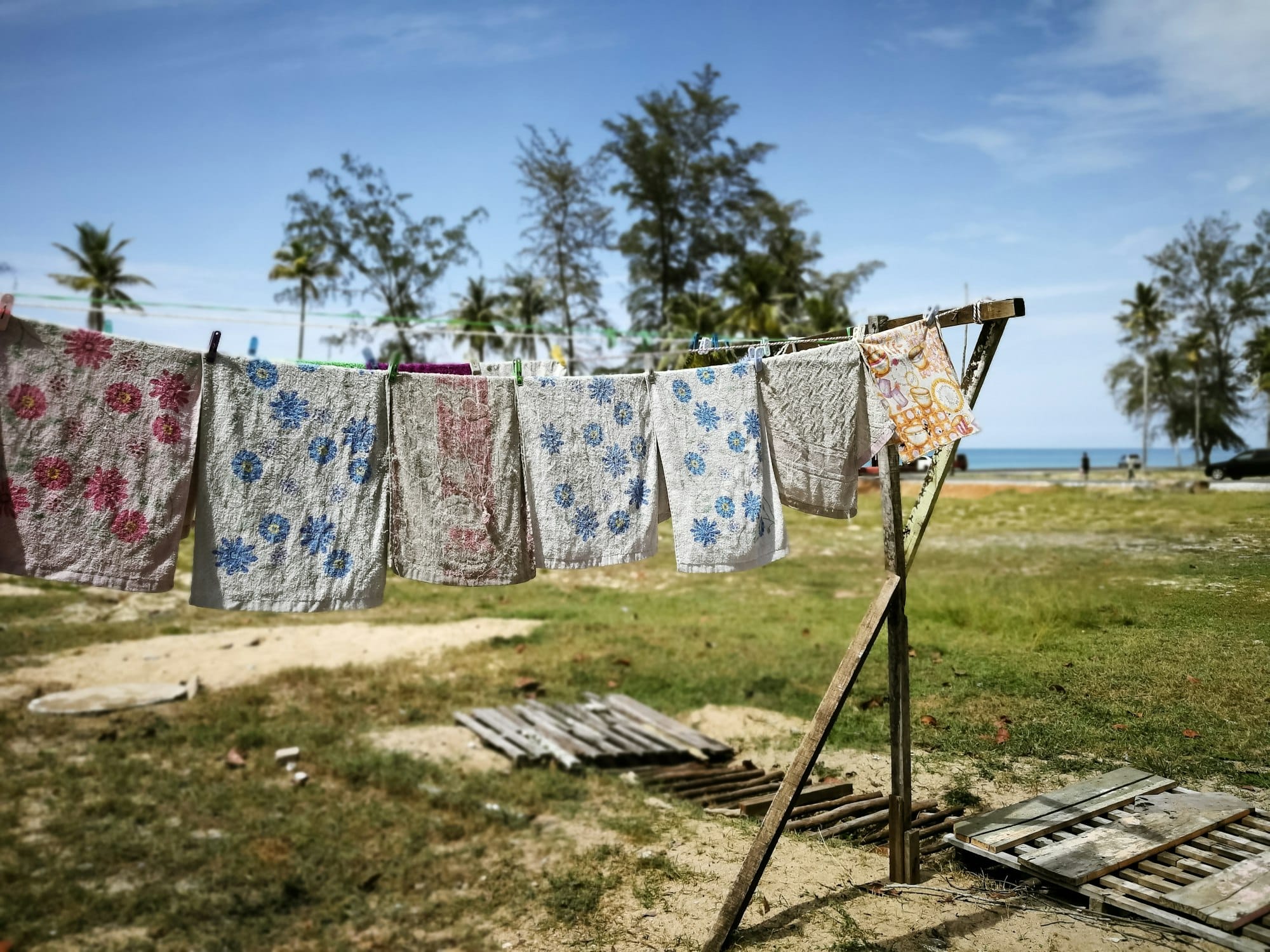 drying the rags under the hot sun at the beach