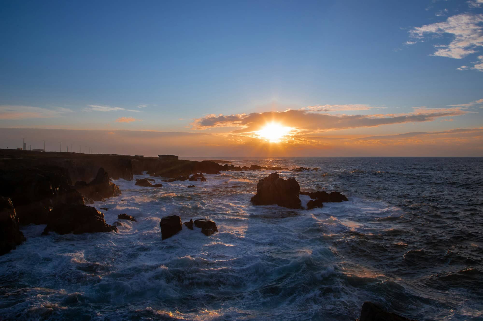 Scenic view of the ocean and cliffs during a mesmerizing sunset. Sines, Portugal.