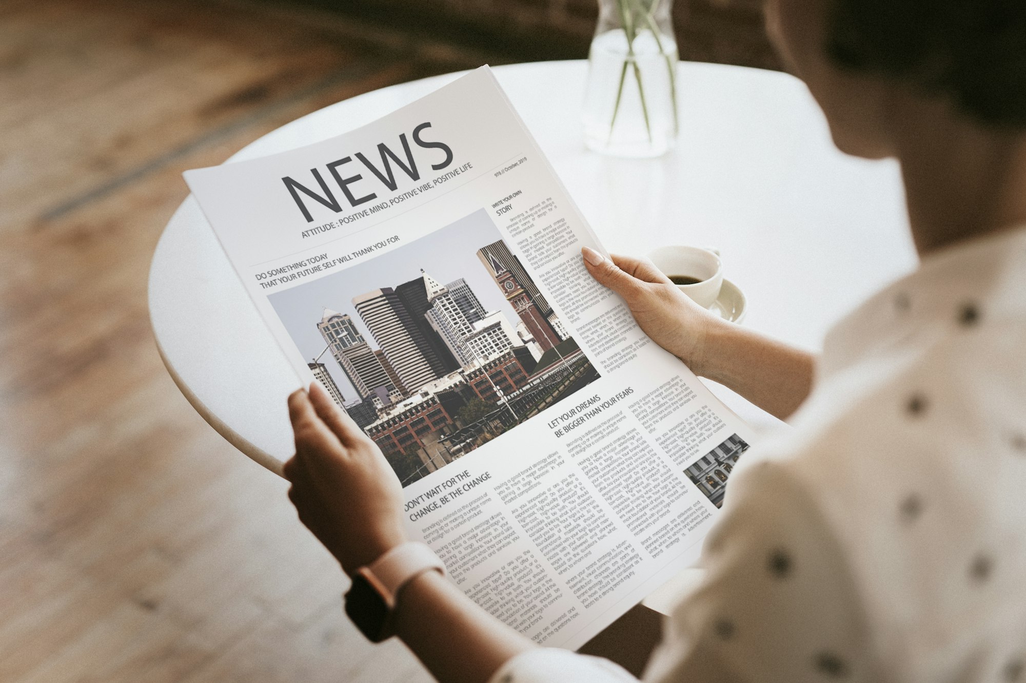 Woman reading a newspaper